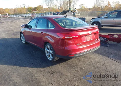 2016 Ford Focus Titanium from USA, damaged, VIN 1FADP3J24GL305028